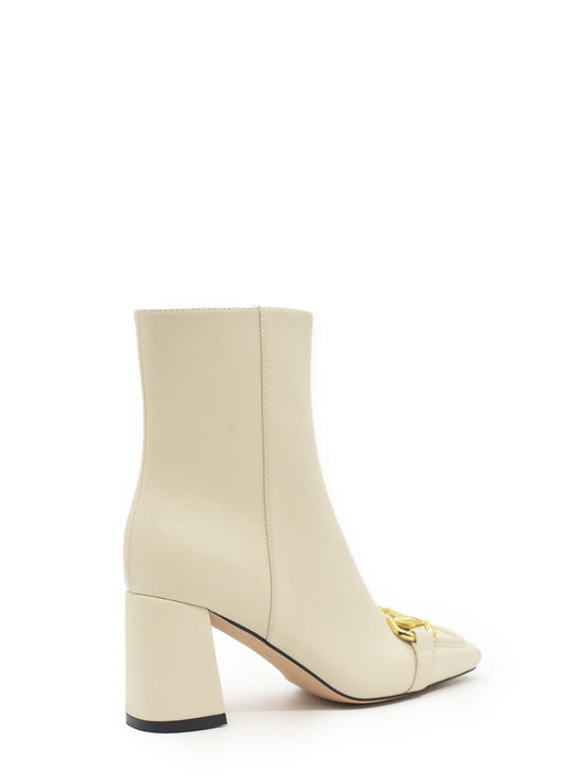 Ice-colored heeled ankle boot with buckle on upper